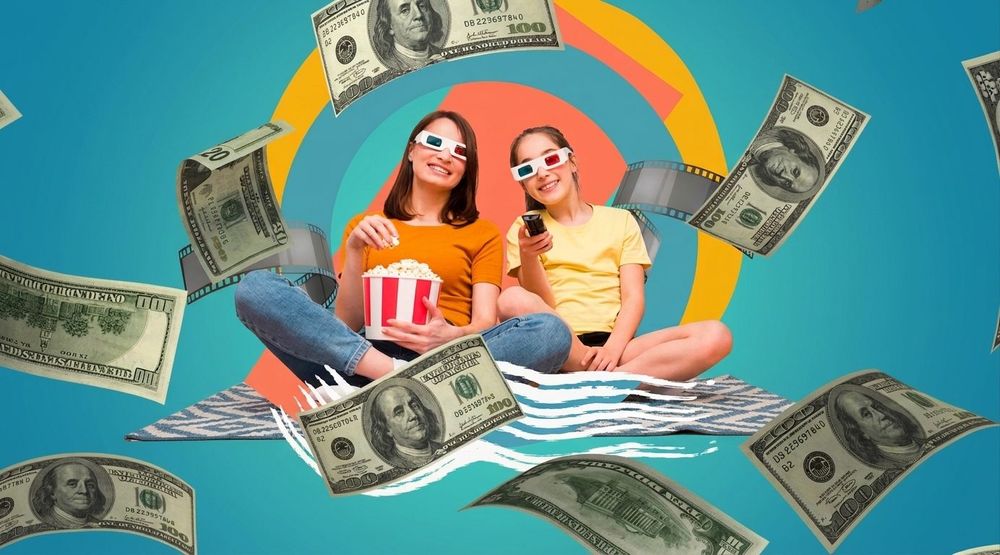Person watching videos on TesterMAX app to earn rewards.jpeg
